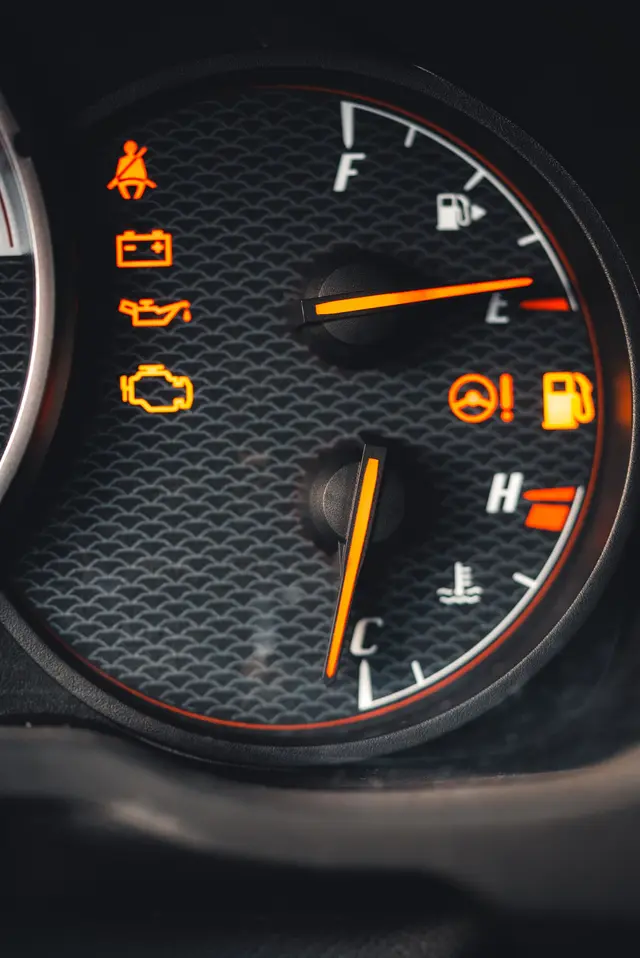 Warning lights lit on a car dashboard